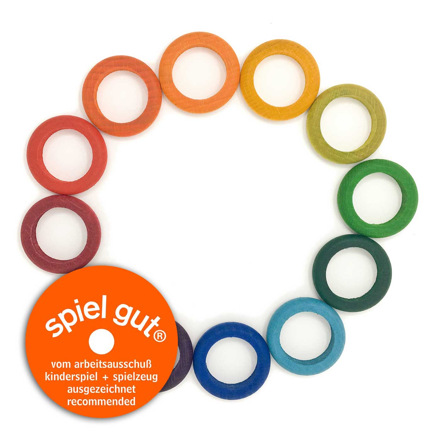 12 wooden rings in a circle, each one color of the rainbow from red to violet.