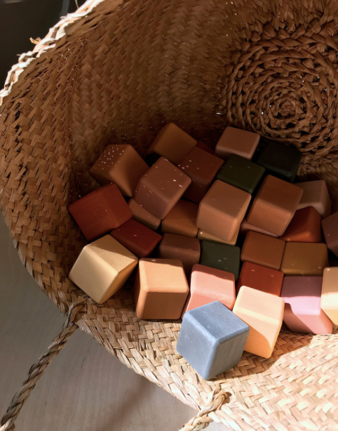 Wooden block set in a basket